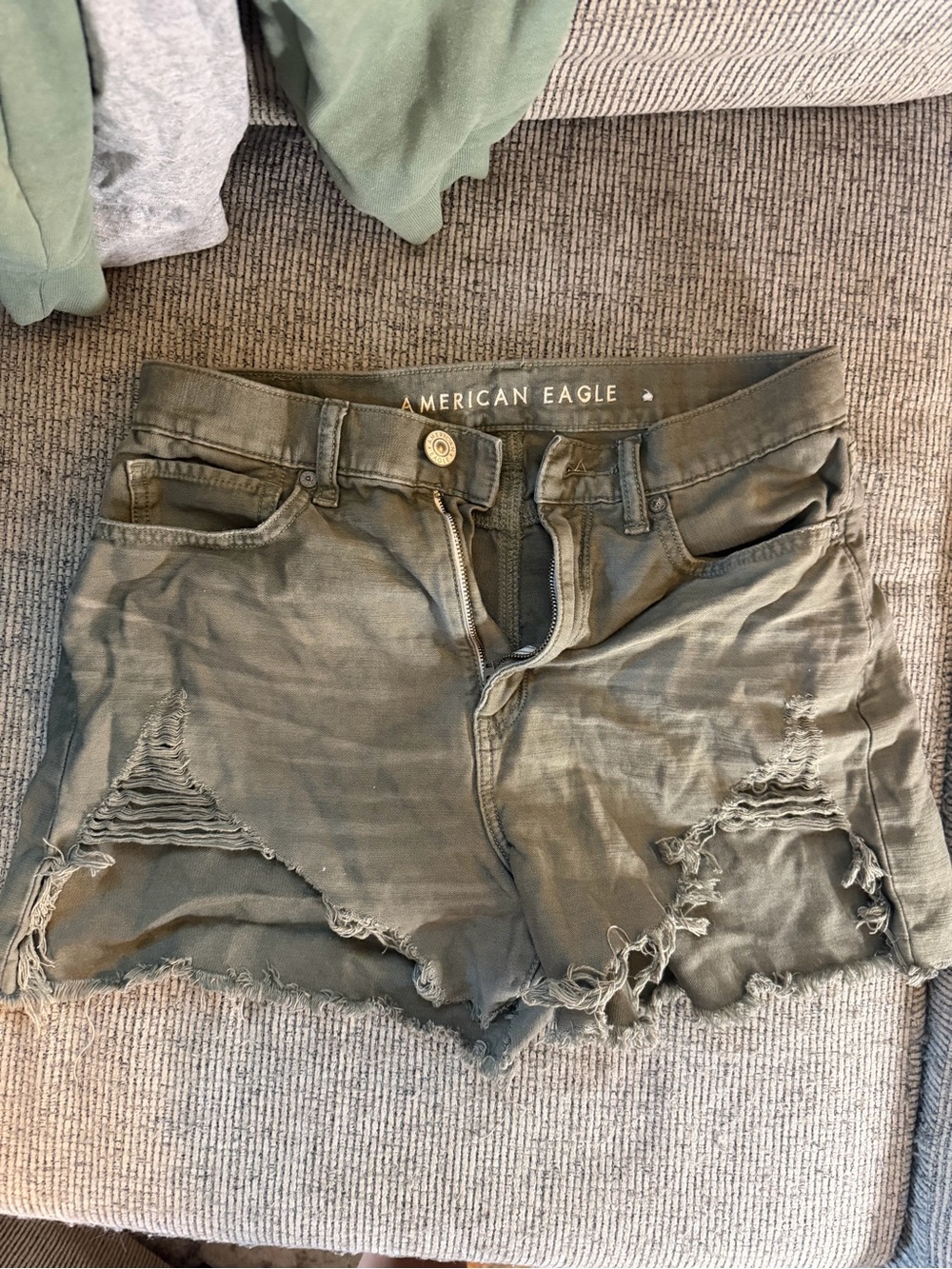 American Eagle Outfitters Olive Green Distressed Denim Cutoff Shorts - Picture 1 of 4